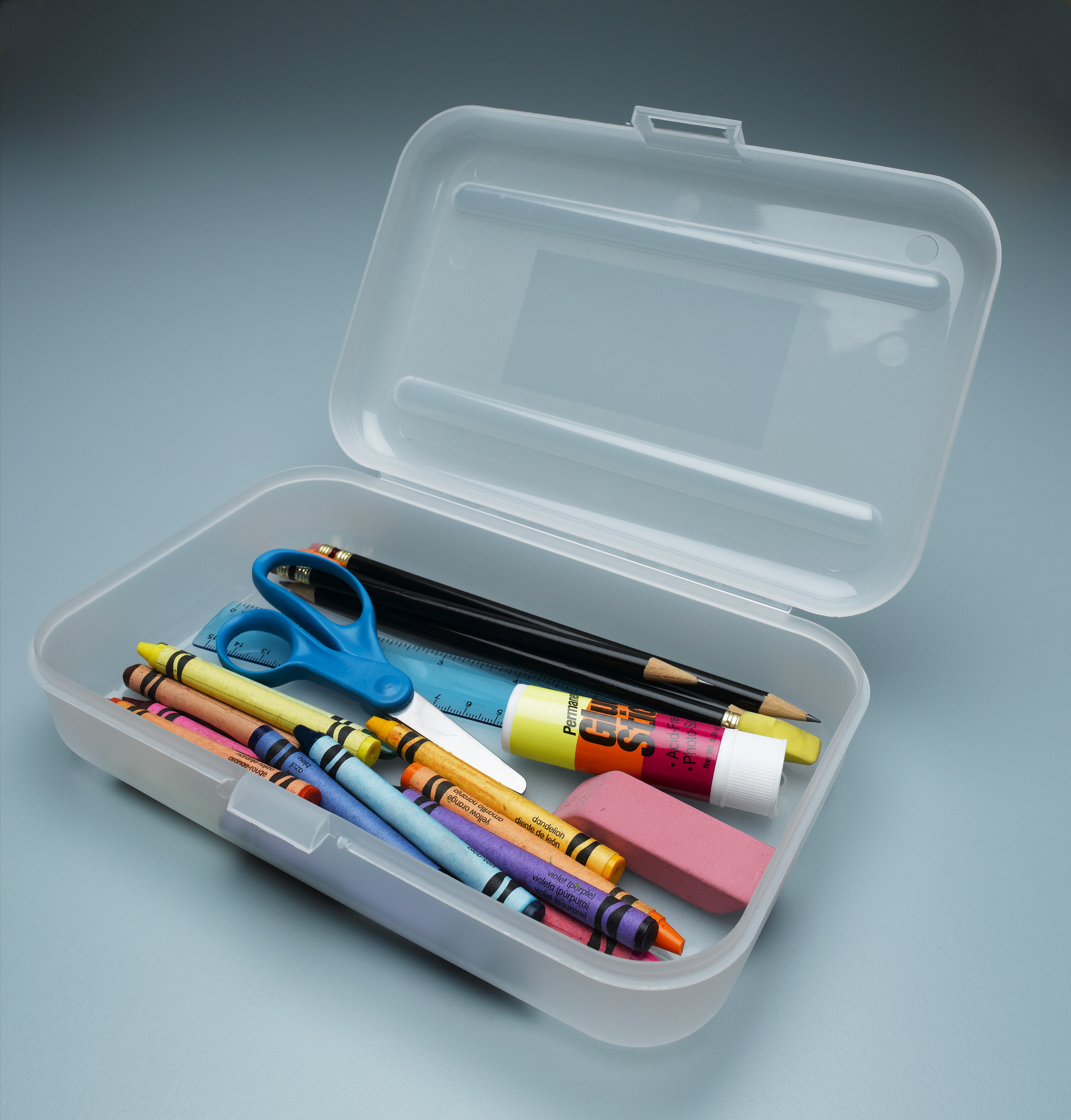 Photo of an open clear pencil box with items stored inside