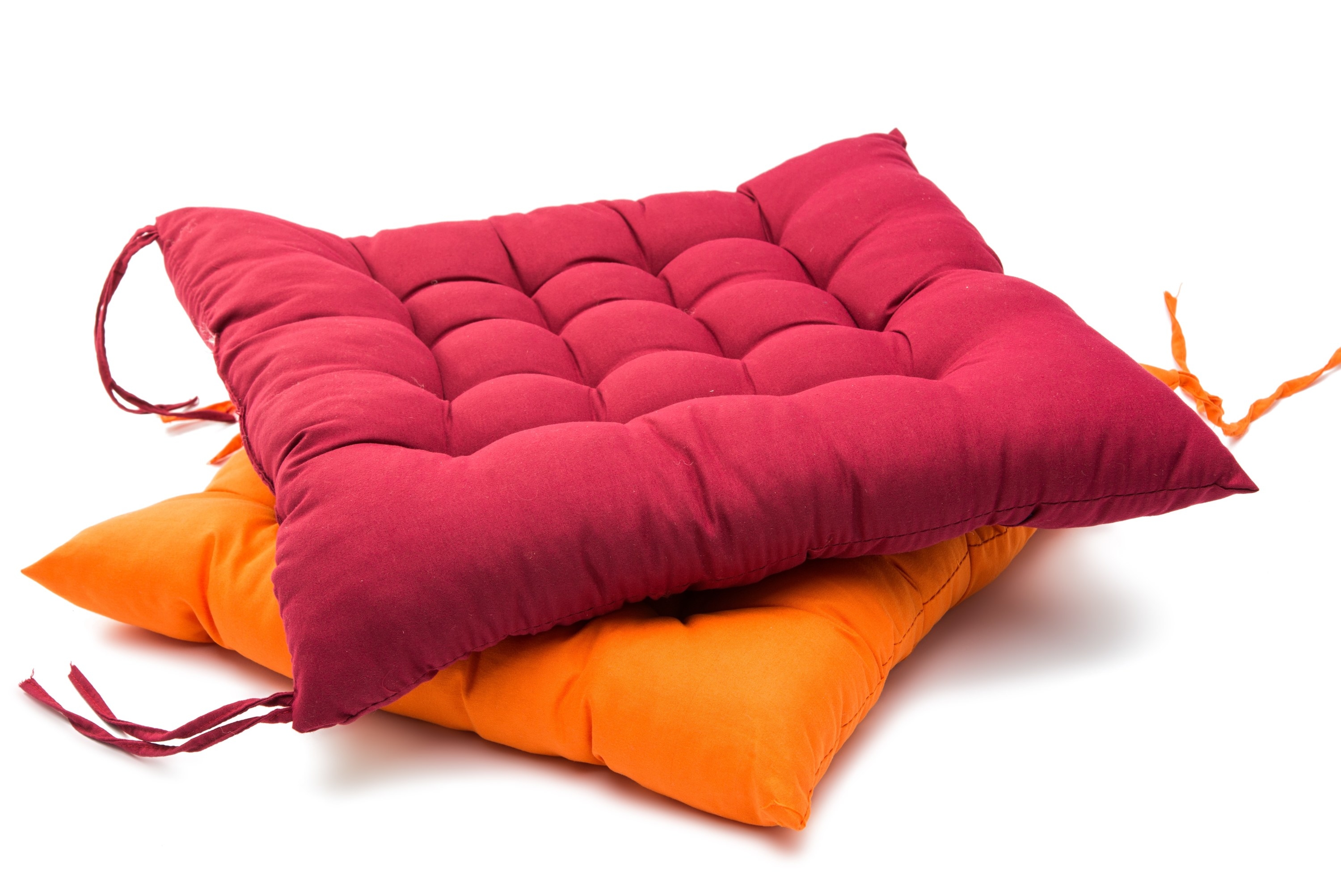 Photo of colorful seat cushions against a white backdrop