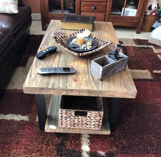 Review photo of the natural farmhouse-style wood coffee table