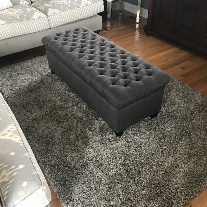Review photo of the gray polyester wide tufted storage ottoman