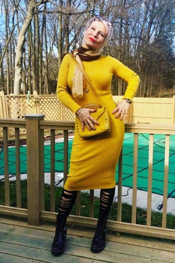reviewer wearing the dress in yellow