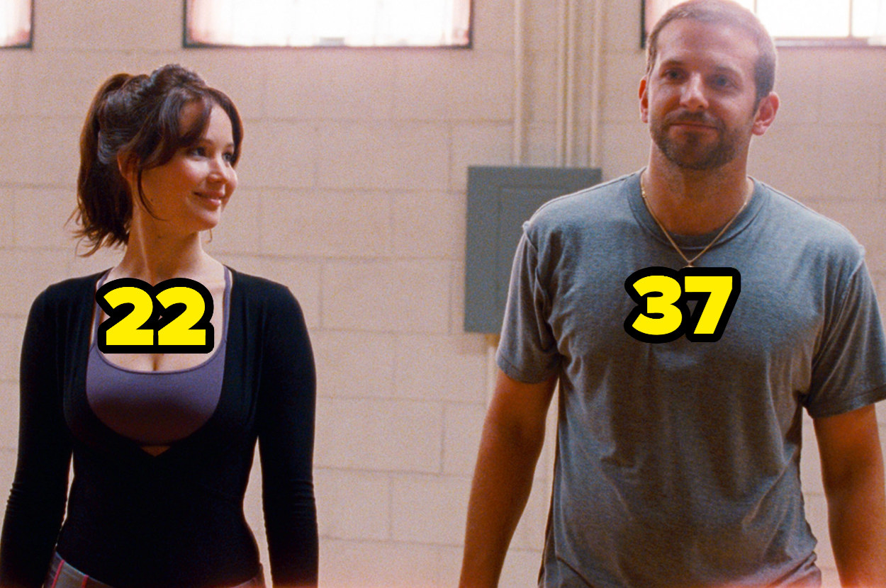 22-year-old Jennifer Lawrence looking at 37-year-old Bradley Cooper