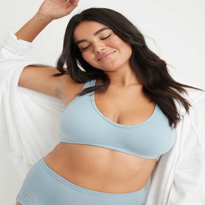 model in light blue bralette and matching undies