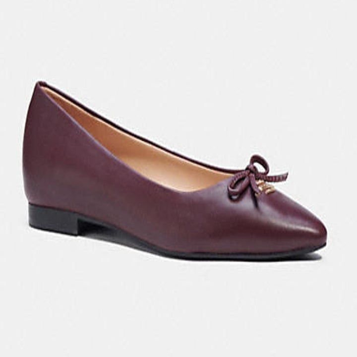 purple ballet flats with small bow on toe section