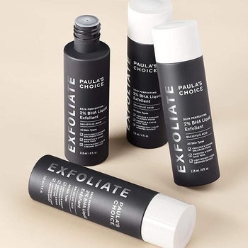 the black bottles with white caps