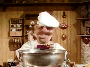 the muppet chef using a mixing bowl