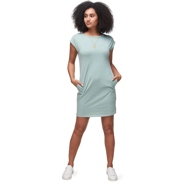 a model in a light blue T-shirt dress