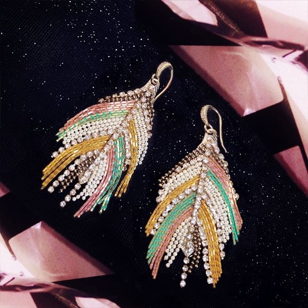 The earrings with colorful accents and crystals