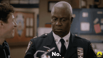 Captain Holt shaking his head and saying no