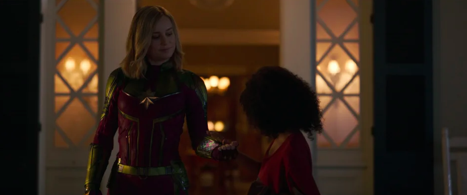 Captain marvel wearing her suit, and Monica changing the colors