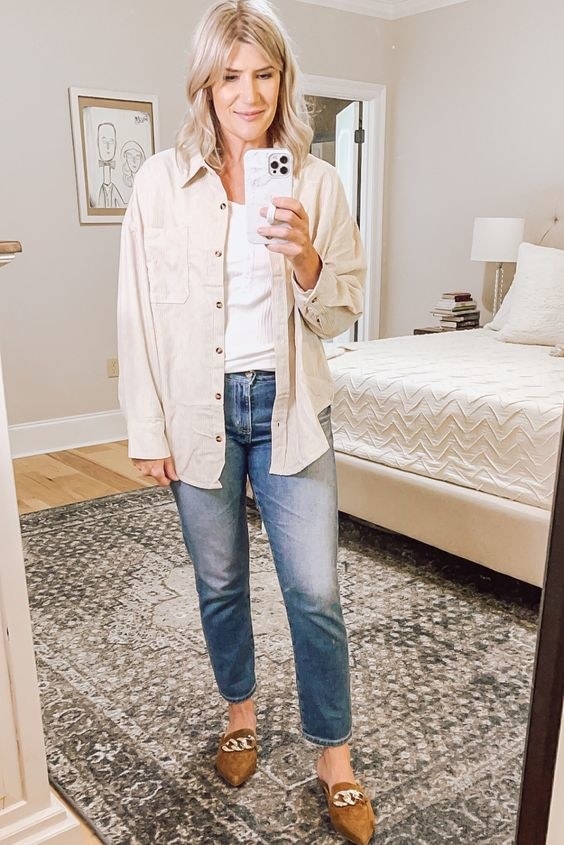 reviewer wearing the oversized button-down in cream