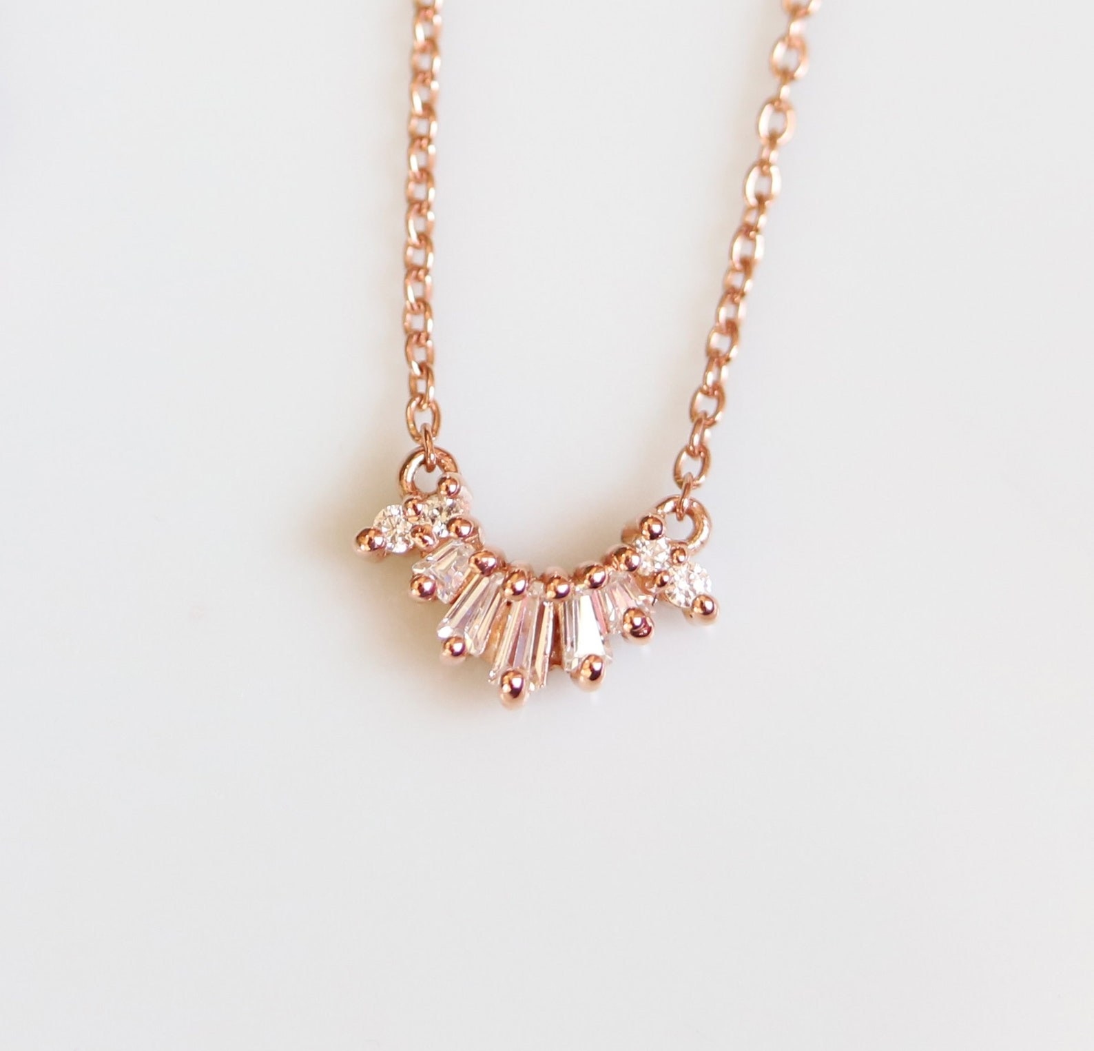 rose gold chain necklace with cluster of cubic zirconia gems