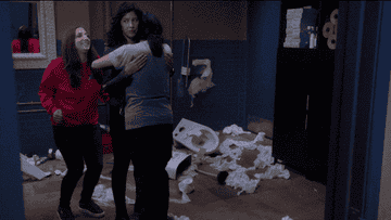 Gina, Rosa, and Amy hugging
