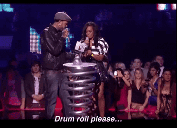 Presenters at an awards show saying &quot;drum roll please&quot;