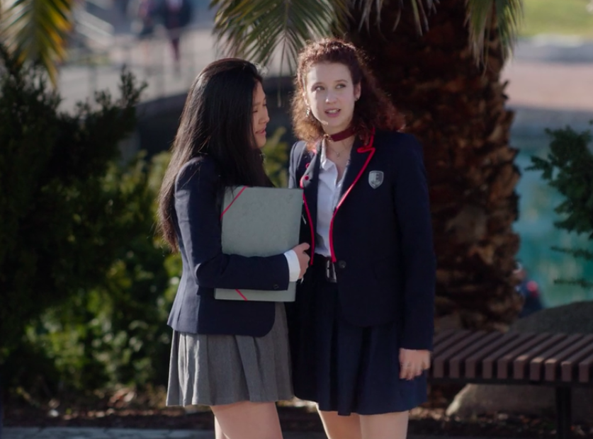 Two students standing outside in their uniforms on &quot;Elite&quot;
