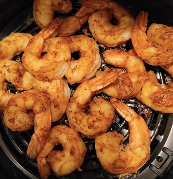 shrimp being made in an air fryer