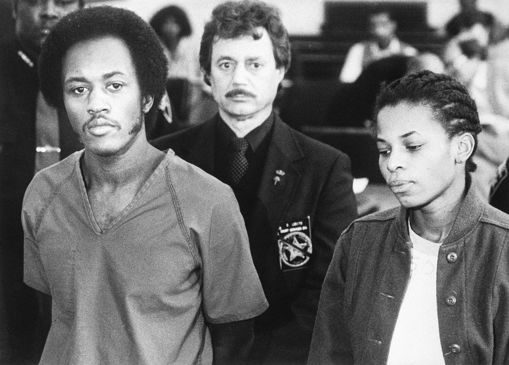 Alton Coleman and Debra Brown standing in a courtroom