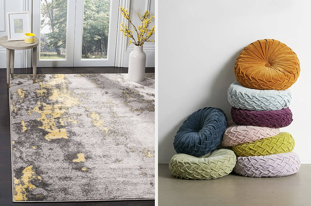 to the left: a gold flecked gray rug, to the right: a pile of circle pillows