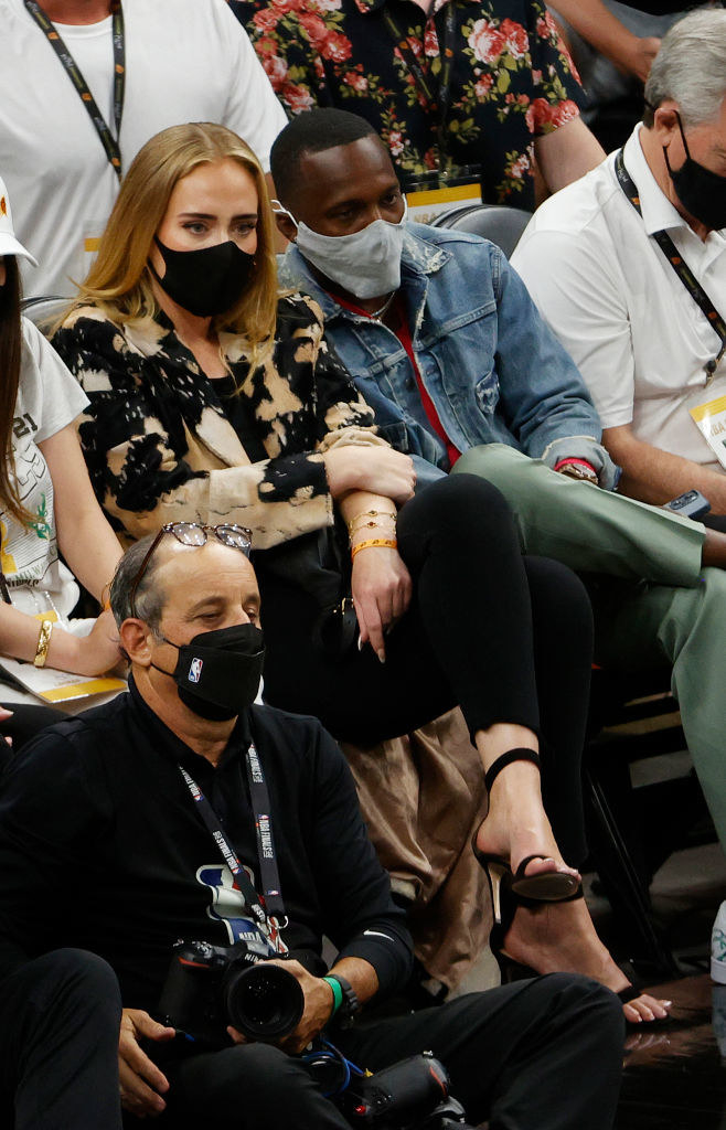 Adele looks on next to Rich Paul during the first half in Game Five of the NBA Finals between the Milwaukee Bucks and the Phoenix Suns