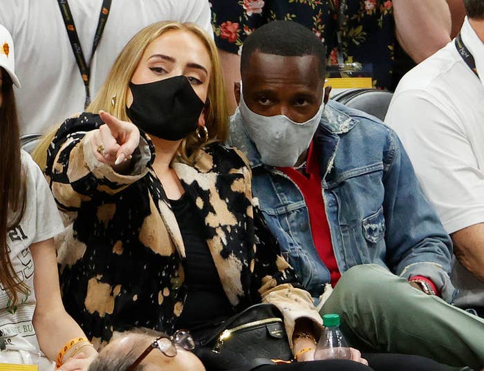 Adele looks on next to Rich Paul during the first half in Game Five of the NBA Finals between the Milwaukee Bucks and the Phoenix Suns