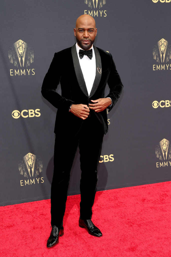 Karamo Brown on the red carpet in a black velvet tux