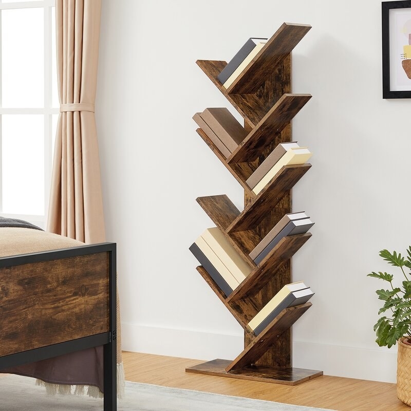 The geometric bookcase with books on it
