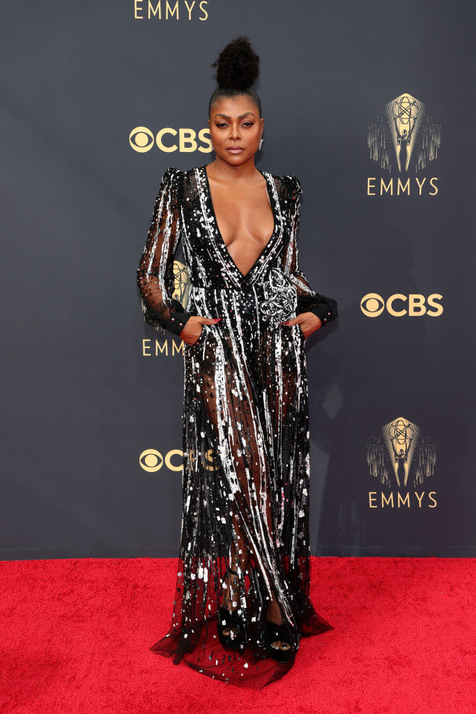 Taraji P. Henson on the red carpet in a black and silver sheer gown