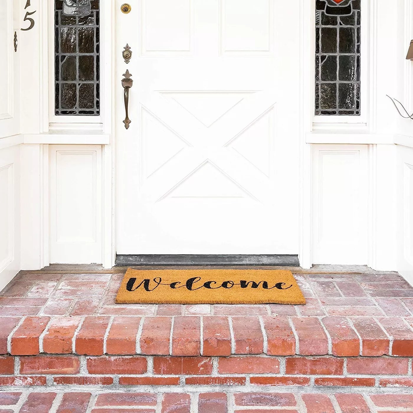The welcome door mat