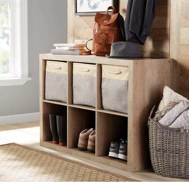 rustic gray 6-cube organizer shelf with baskets and shoes inside