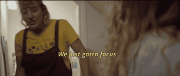 GIF of two women talking, with subtitle: &quot;We just gotta focus&quot; and then &quot;Mmm you smell like ham&quot;