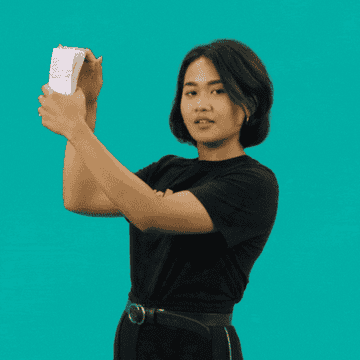 women flipping through a wad of cash pay day gif
