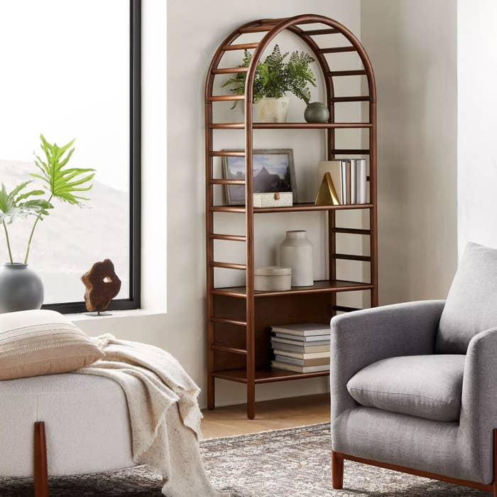 The curved wooden bookcase