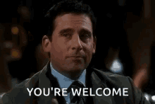 Michael Scott winking and saying &quot;you&#x27;re welcome&quot;