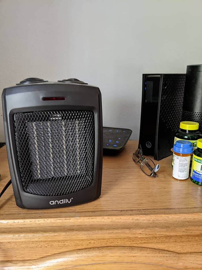 reviewer image of the portable space heater on a dresser
