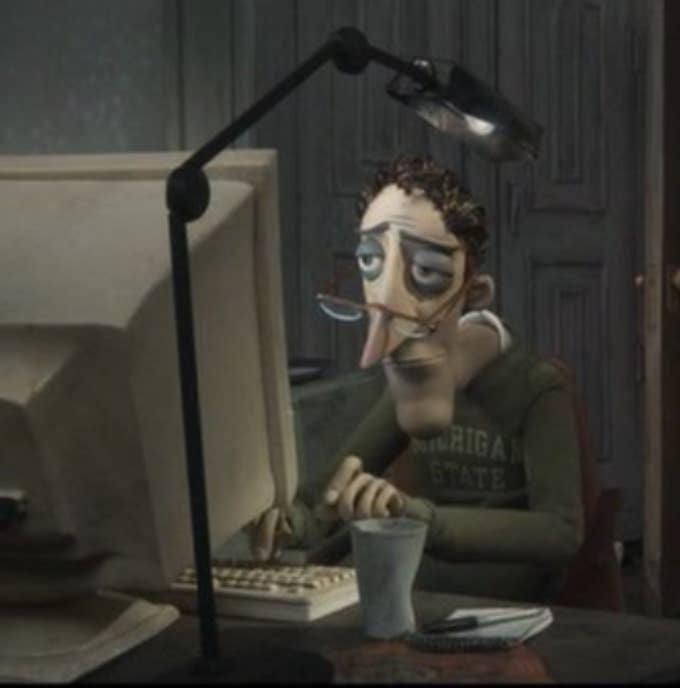 Coraline&#x27;s dad typing while looking sad in Coraline