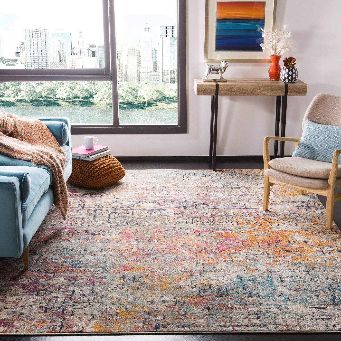The yellow, pink, and blue rug