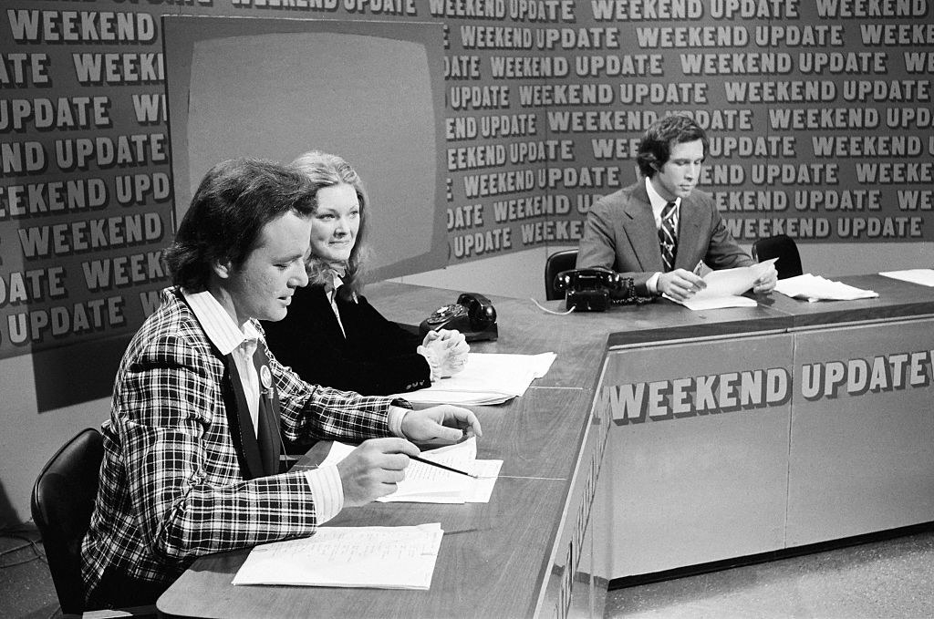 Bill Murray, Jane Curtain, and Chevy Chase doing weekend update
