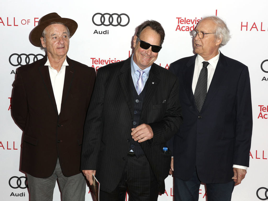 Bill Murray, Dan Aykroyd, and Chevy Chase on the red carpet