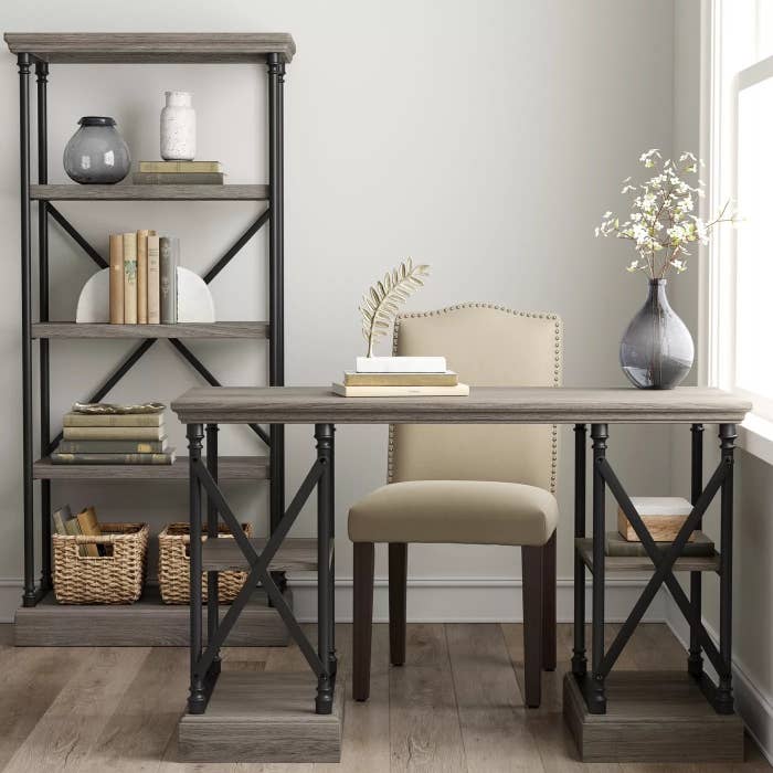 Writing desk with assorted items on it in an office