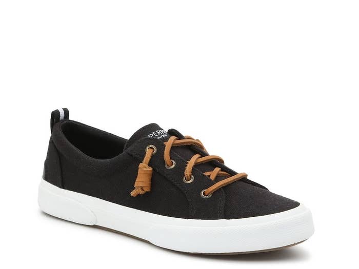 Black slip on shoes with brown laces