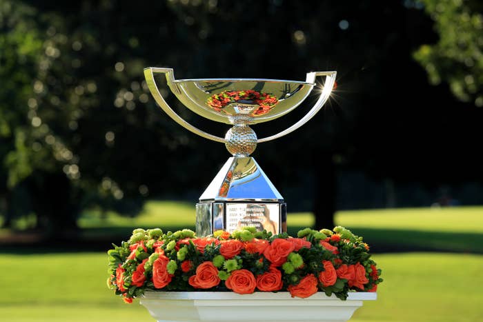 Tour championship trophy surrounded by flowers