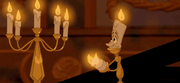 a gif of lumiere from beauty and the beast alongside another candelabra