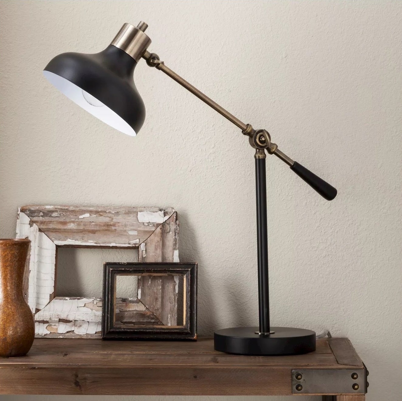 The lamp next to some items on a desk