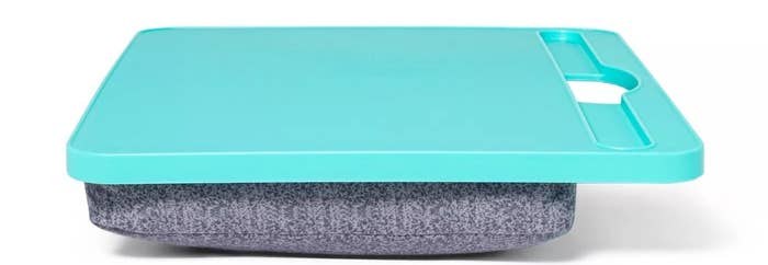 A side view of the lap desk that shows the cushion on the bottom