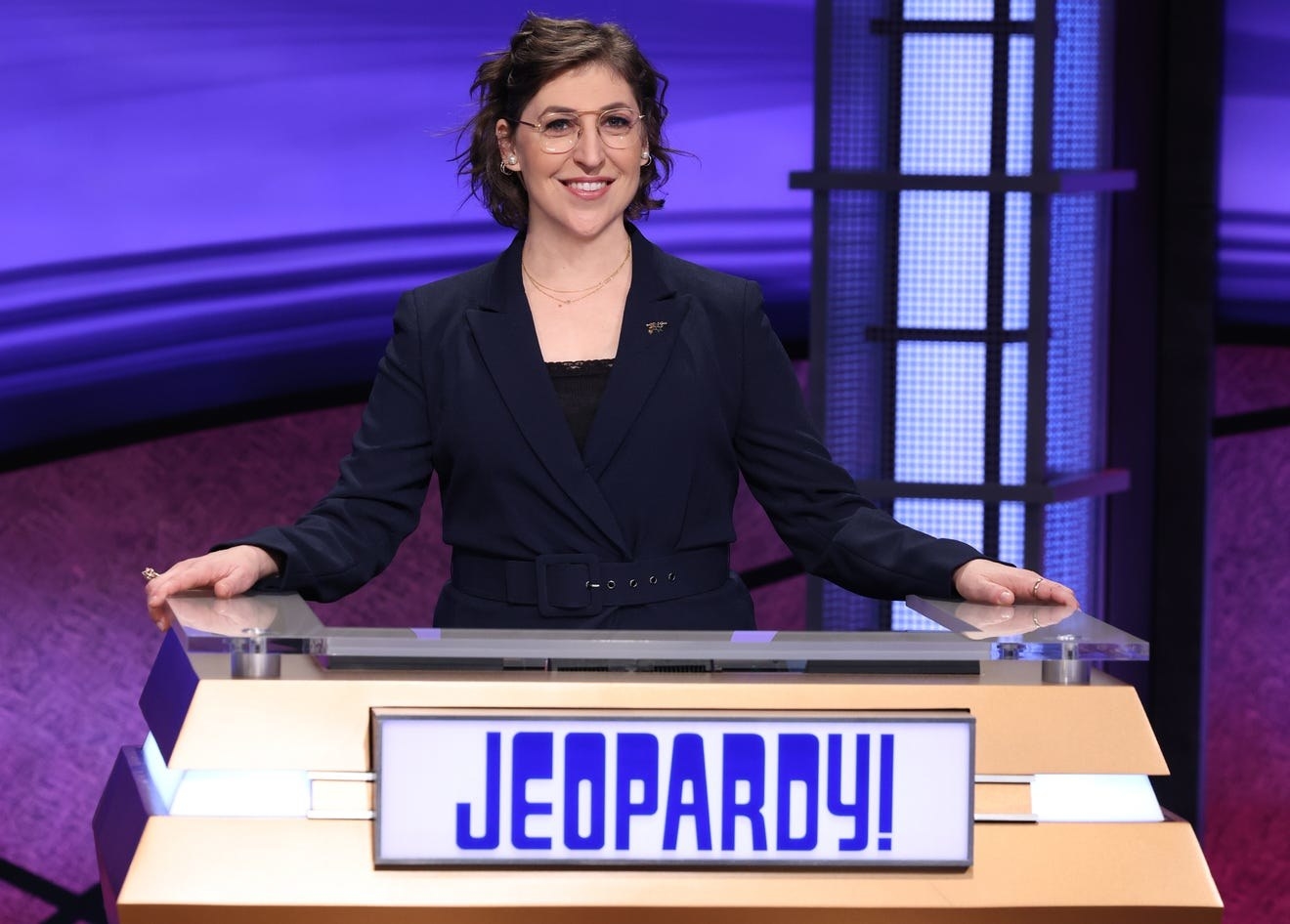 Mayim Bialik at the Jeopardy! podium