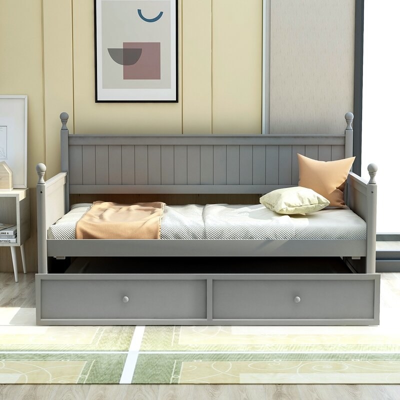 The gray daybed in use