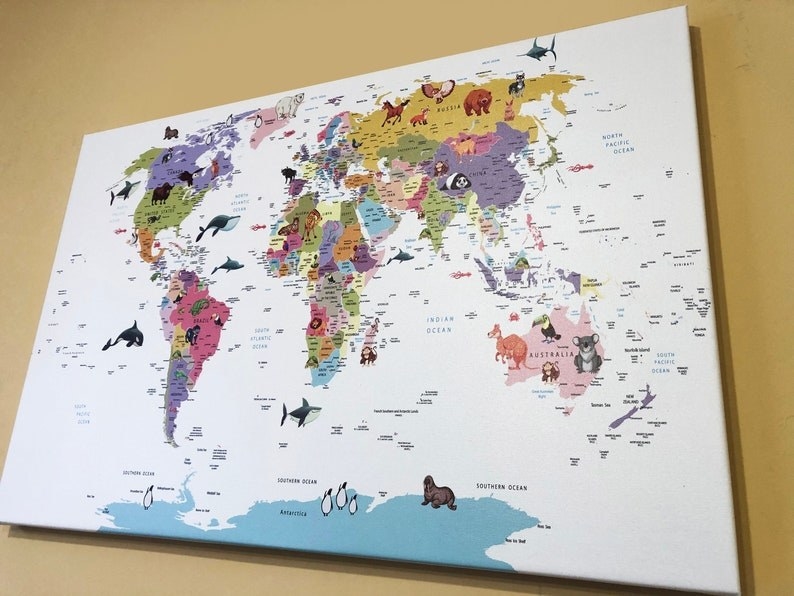 Colorful world map hung on wall
