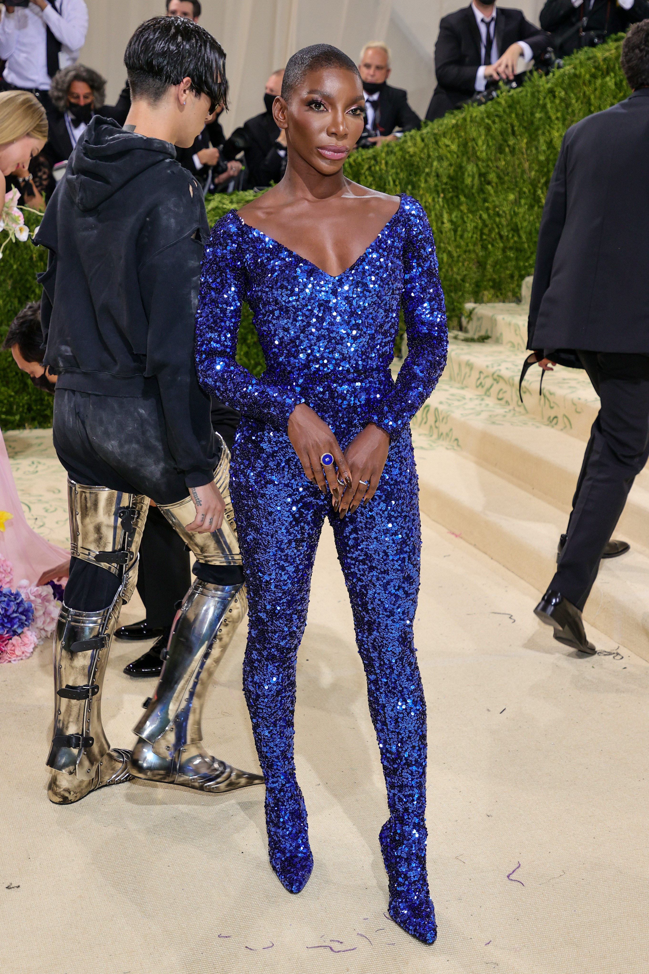 Michaela on the Met Gala steps in a sequined bodysuit