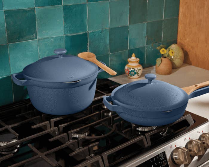 the always pan and perfect pot in blue on a stove top