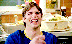 Gif of Ashton Kutcher laughing in &quot;That &#x27;70s Show&quot;